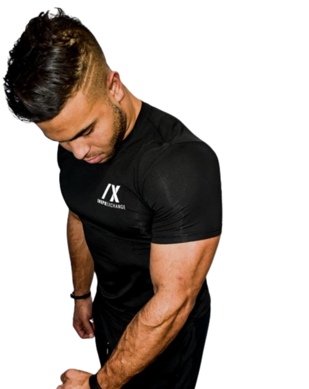 Model wearing men's drifit shirt apex while flexing his muscles showing how stretchy the shirt can be. 