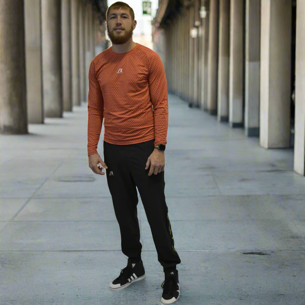 Bright orange ribbed dry fit long sleeve, with black ribs for the edge for the consistent.