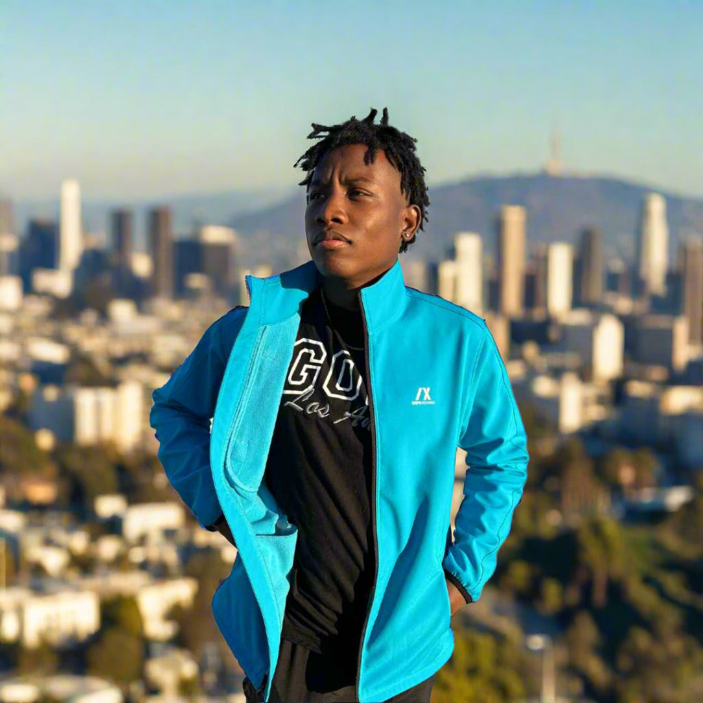 Blue water resistant trailblazer jacket with zip pockets for the go getters.